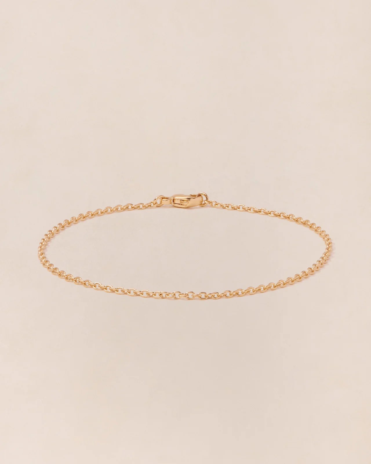 Le bracelet chaîne simple 18cm doré à l'or fin 24 carats