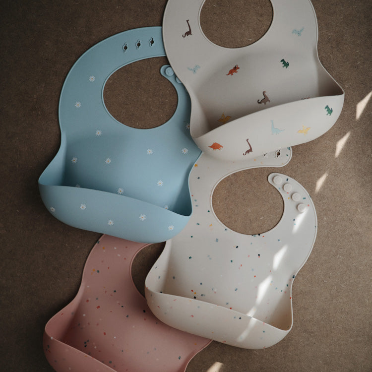 Bavoir en silicone White Daisy (fleur)