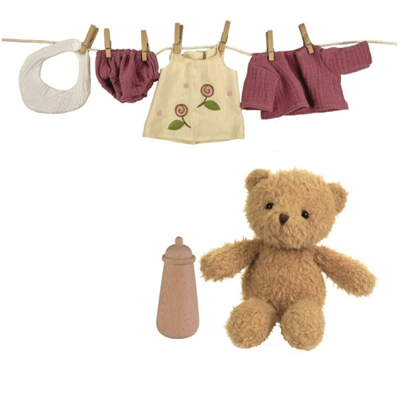 MORRISSETTE ET SES HABITS DANS UNE VALISE