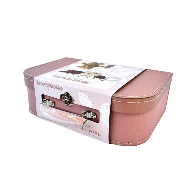 MORRISSETTE ET SES HABITS DANS UNE VALISE
