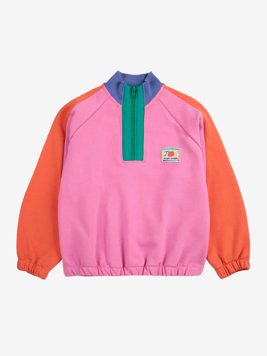 Sweat-shirt à blocs de couleurs souriant