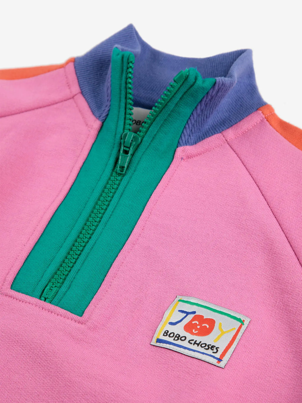 Sweat-shirt à blocs de couleurs souriant