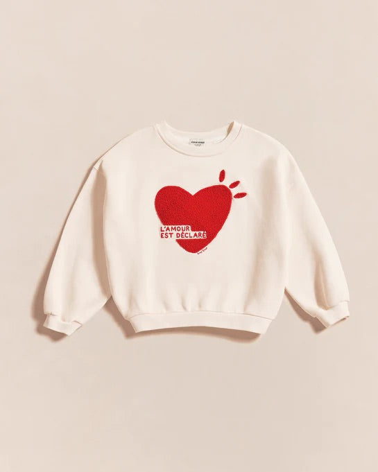 Le sweat l'amour est déclaré enfant en coton bio - crème