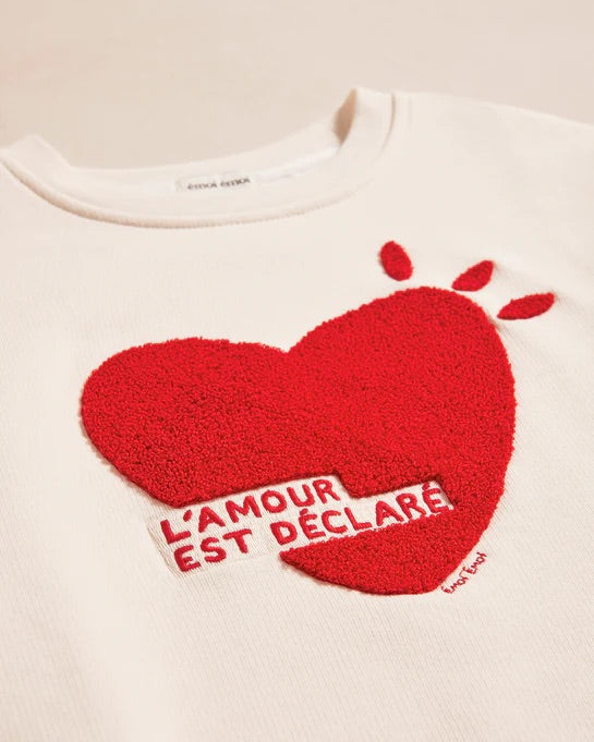 Le sweat l'amour est déclaré enfant en coton bio - crème