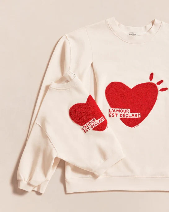 Le sweat l'amour est déclaré enfant en coton bio - crème