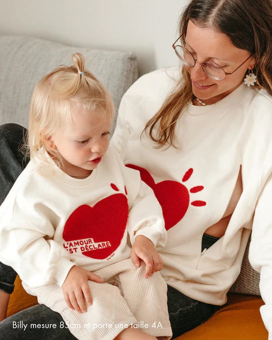 Le sweat l'amour est déclaré enfant en coton bio - crème