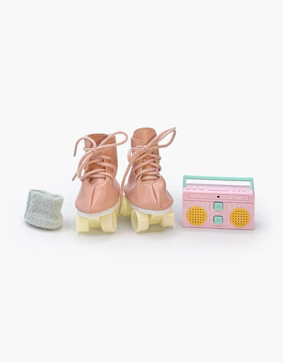 Lot accessoires rollers Mini Panchas avec patins roses